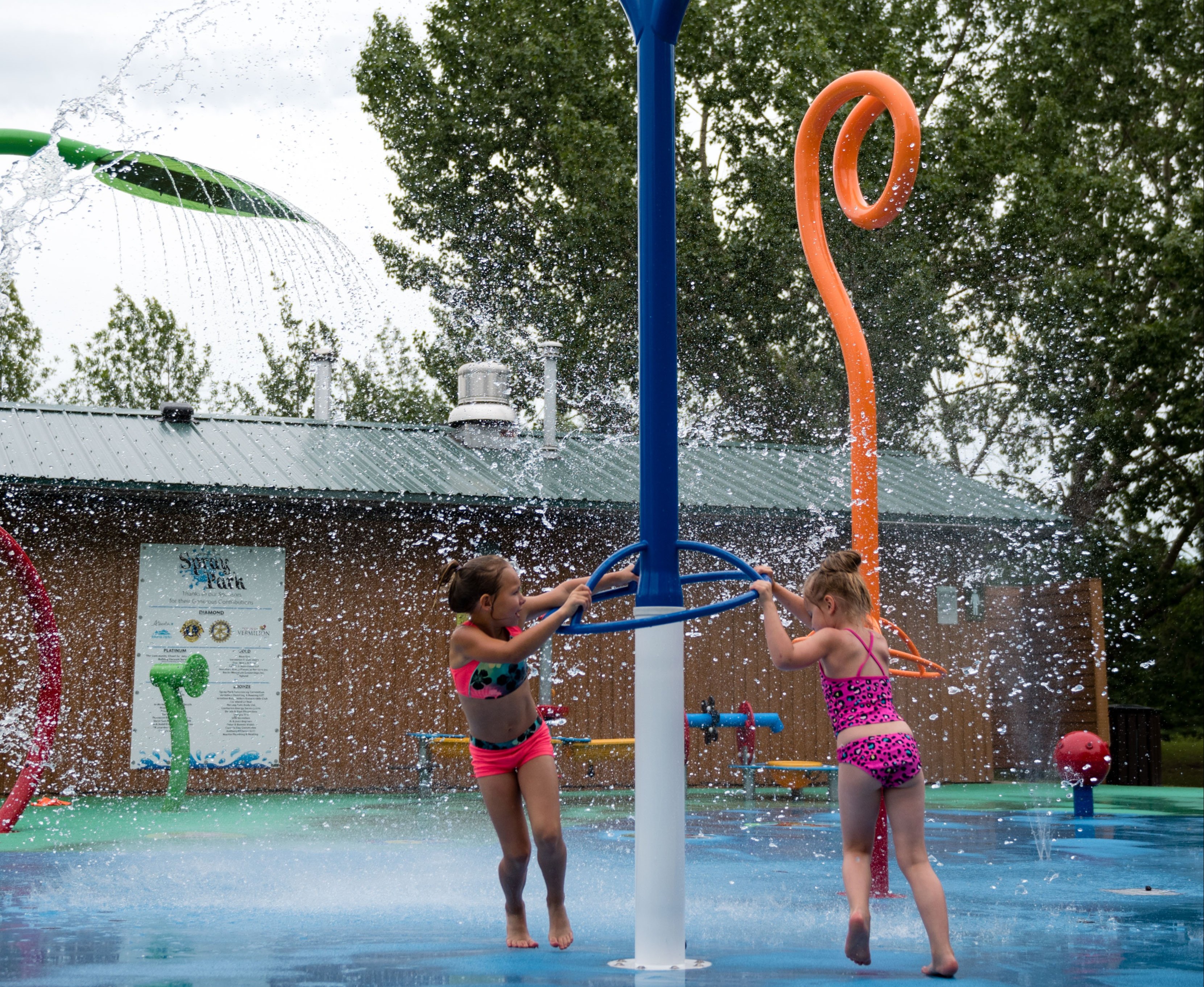 Children playing at the splash park